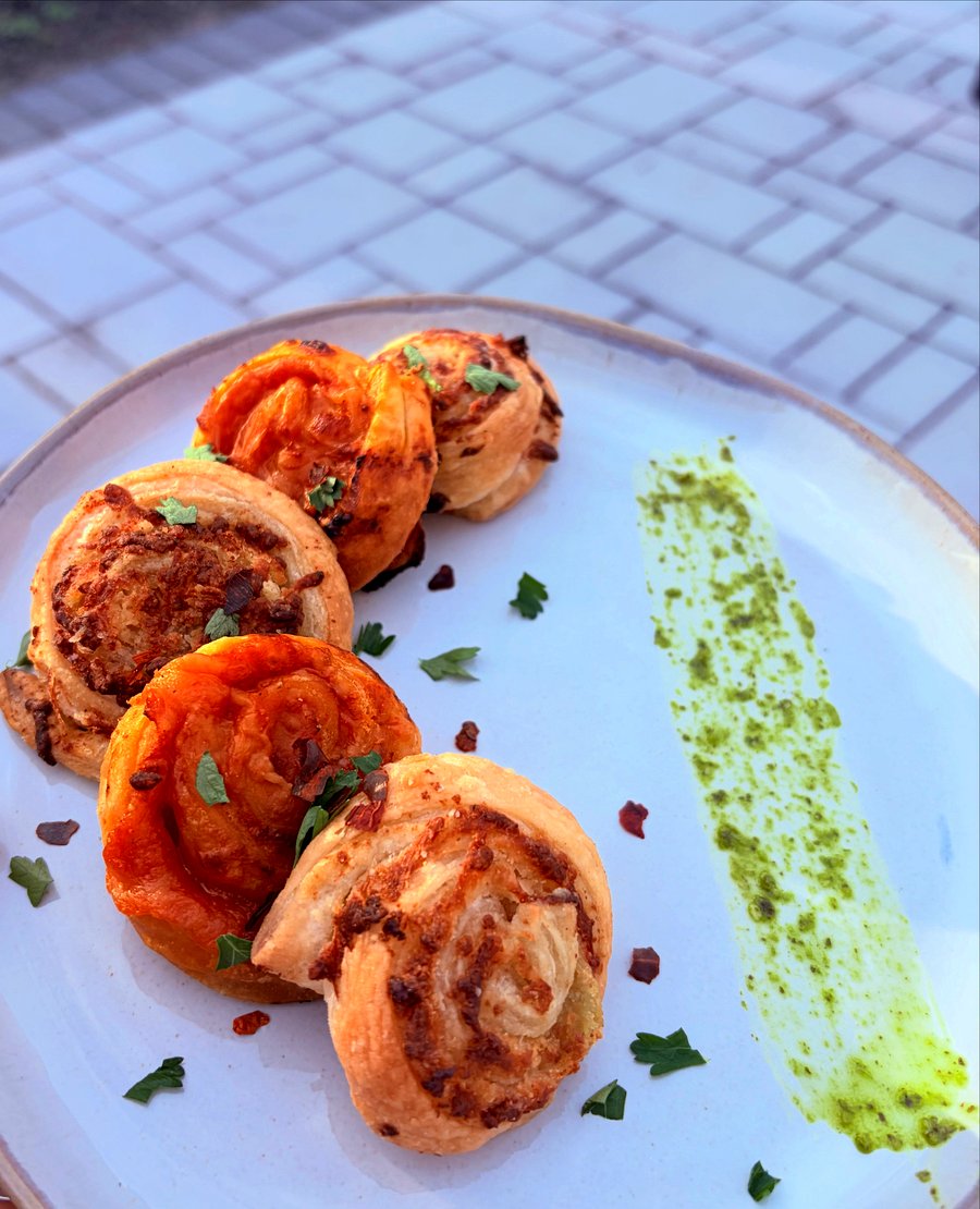 Savory pinwheel pastries with herb oil by Aashvi